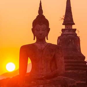 Buddha statue in sunset